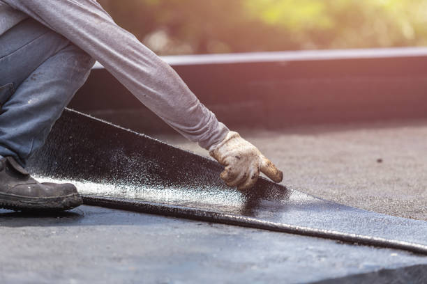 Professional Basement Waterproofing technician working in Greentown, OH